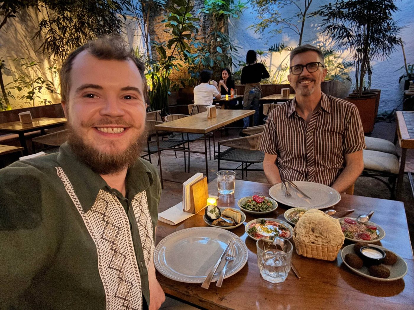 Colleagues sharing dinner while traveling for work.